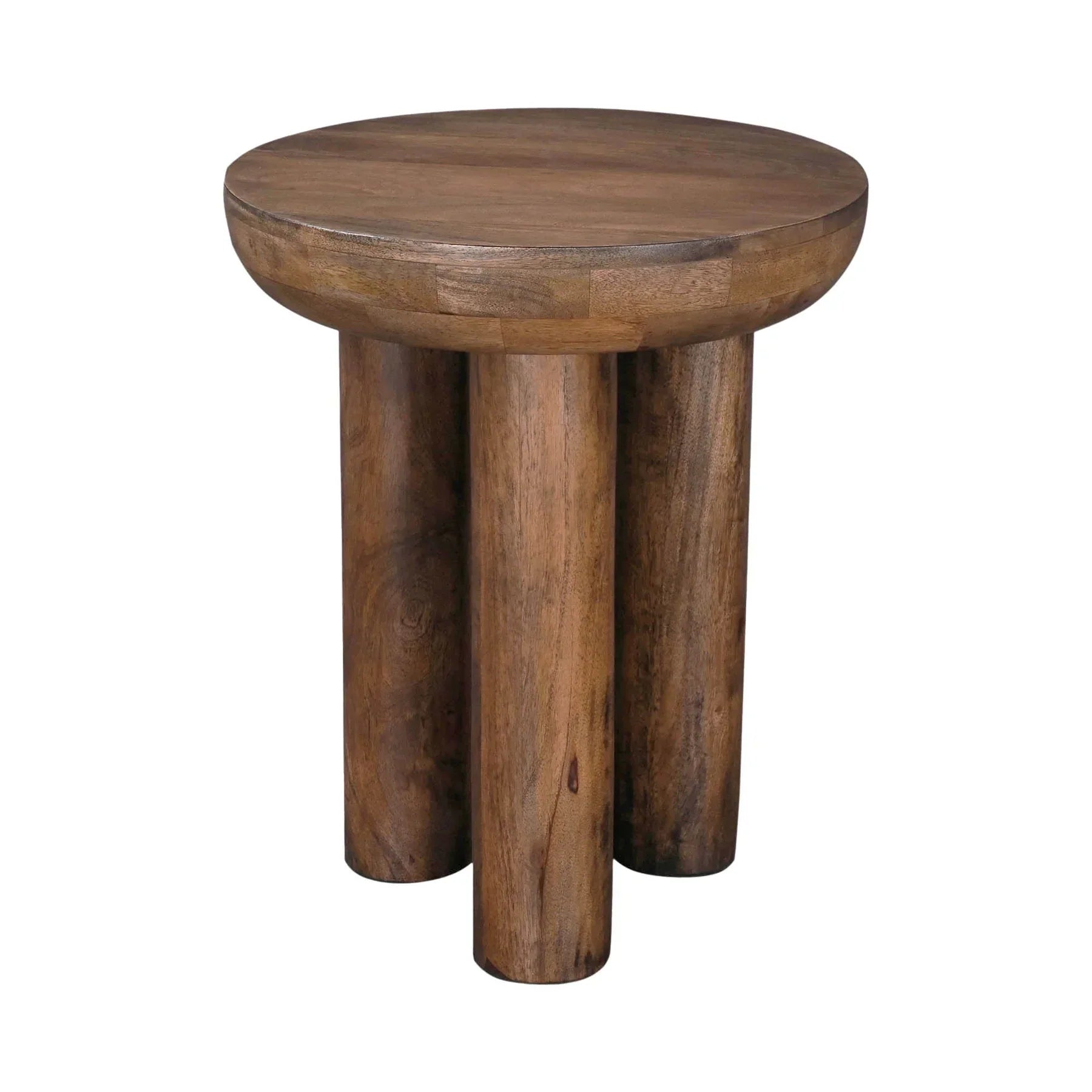 Lifestyle view of the Wilder table styled as a minimalist nightstand in a bright bedroom setting next to a white bed