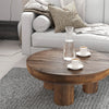 Lifestyle shot featuring the Wilder coffee table styled with coffee cups in a modern minimalist lounge area