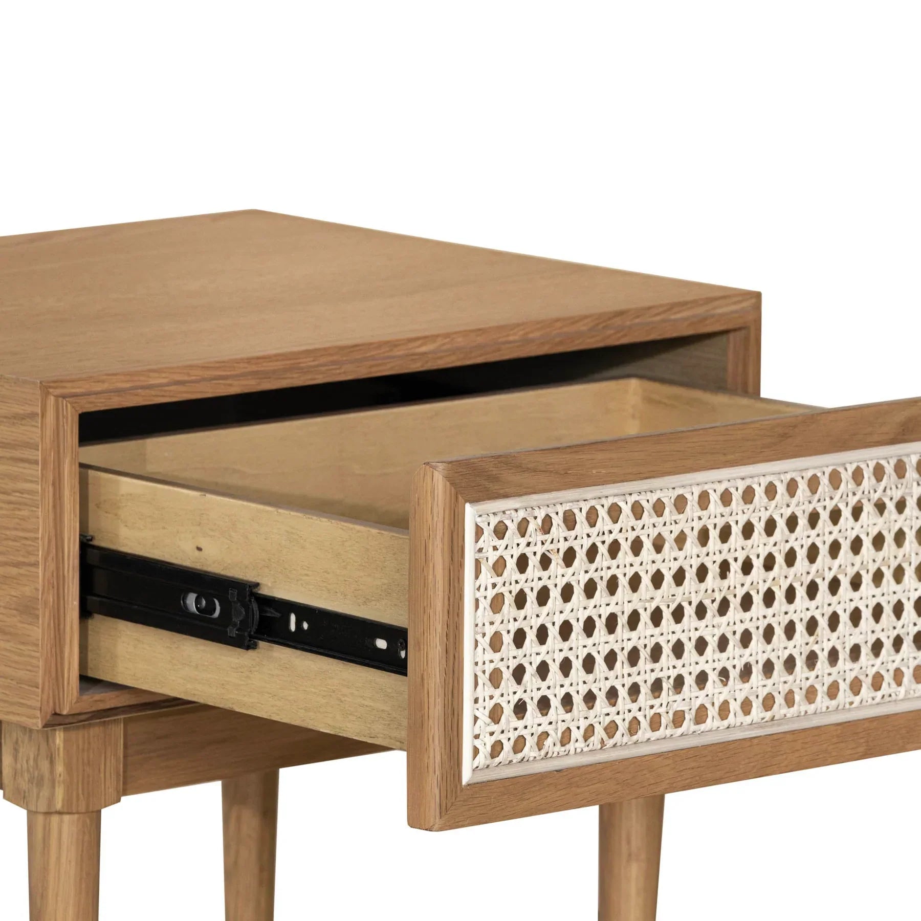 Straight-on front view showcasing the clean lines of the oak frame and the high-contrast white rattan caning