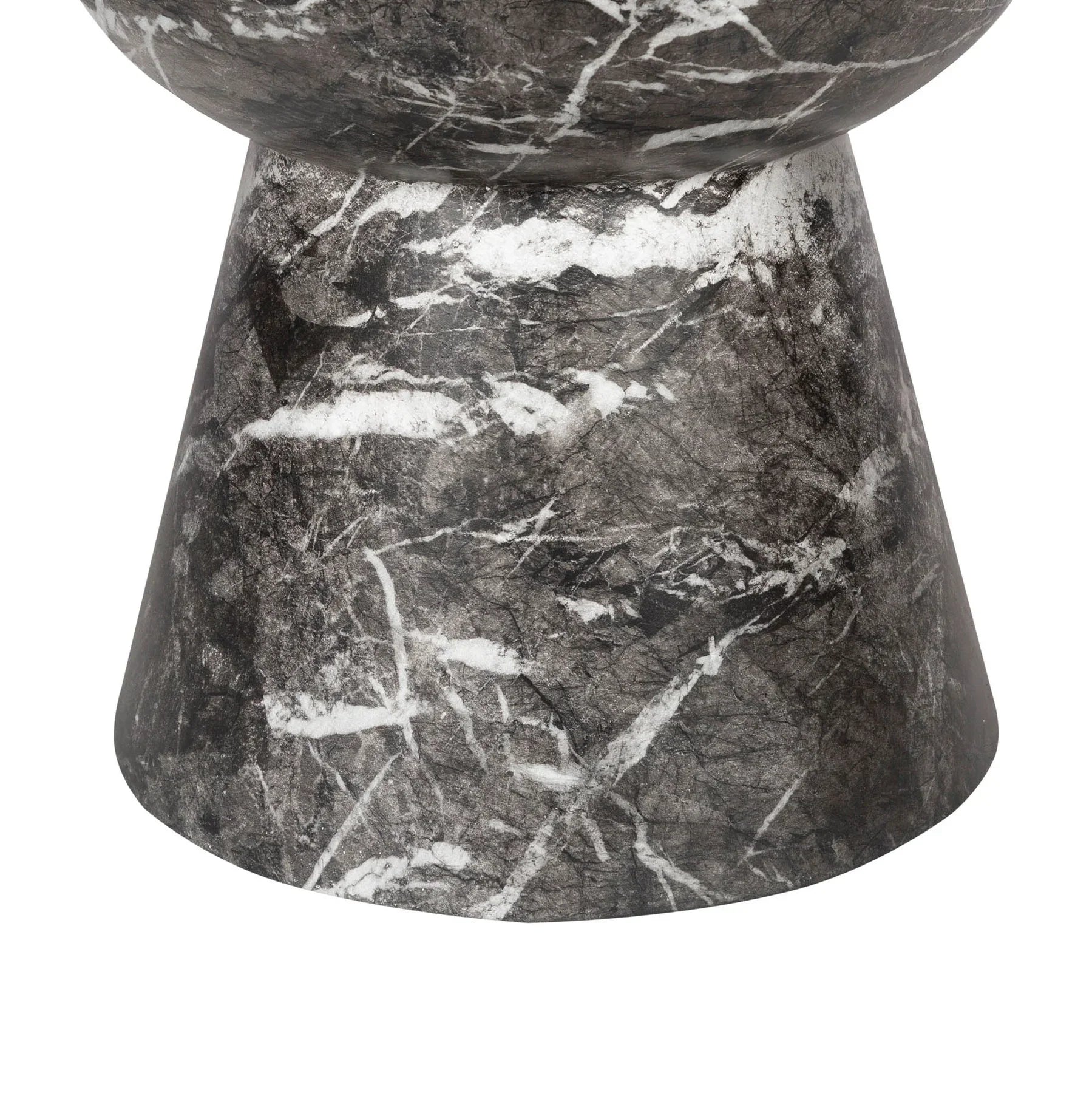 Three-quarter view of the Yves side table featuring a sculptural hourglass silhouette crafted from dark charcoal marble with prominent white veining