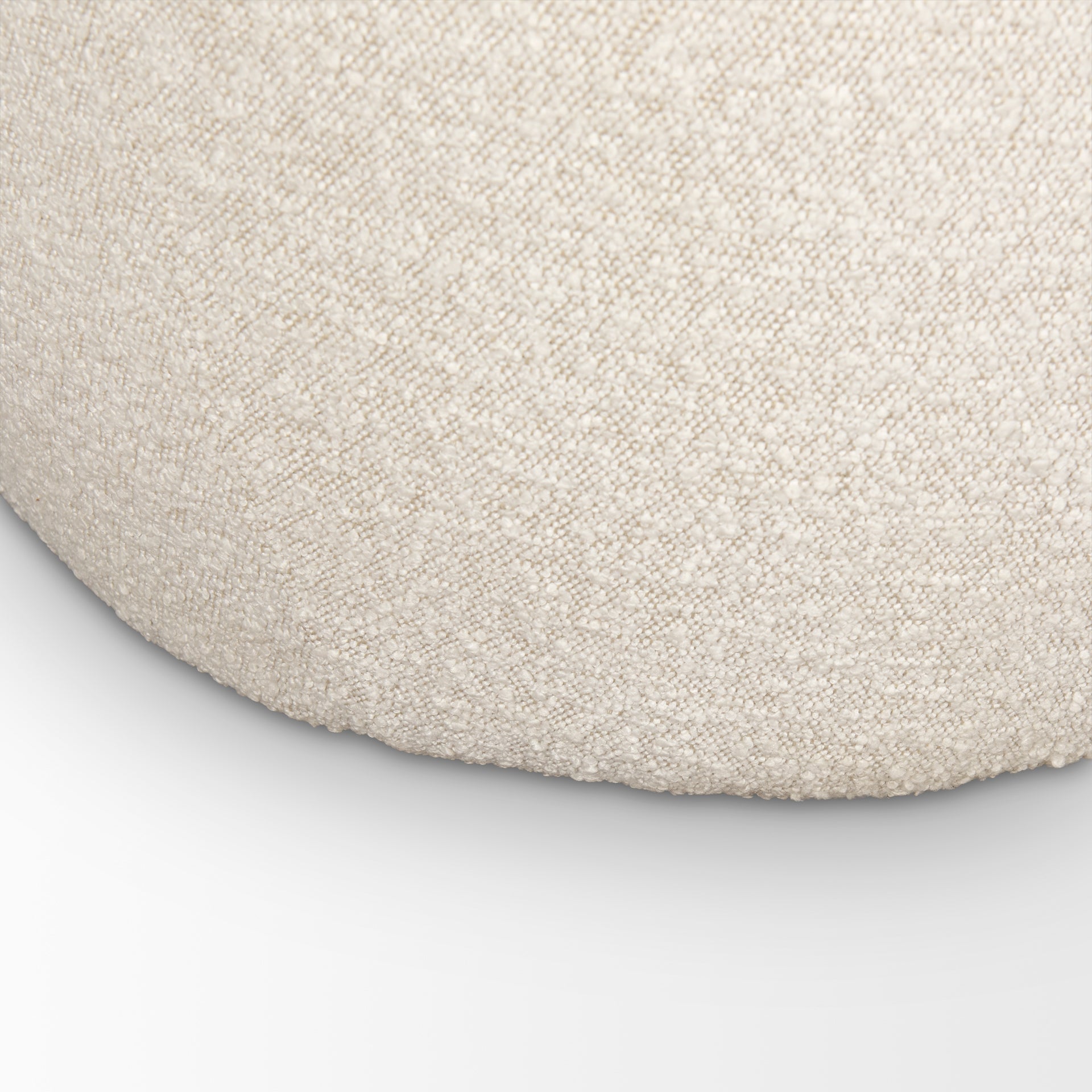 Front view of the Beverly high-back accent chair in oatmeal bouclé fabric with a sculptural pebble silhouette.