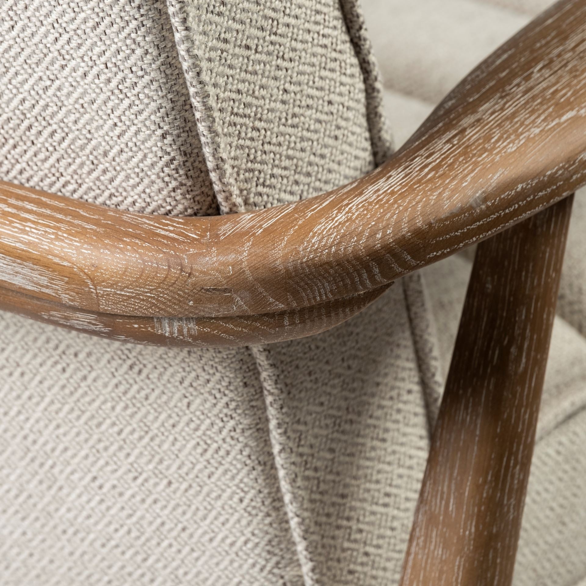 Front view of the Ajax Accent Chair in white textured fabric with a natural oak wood frame