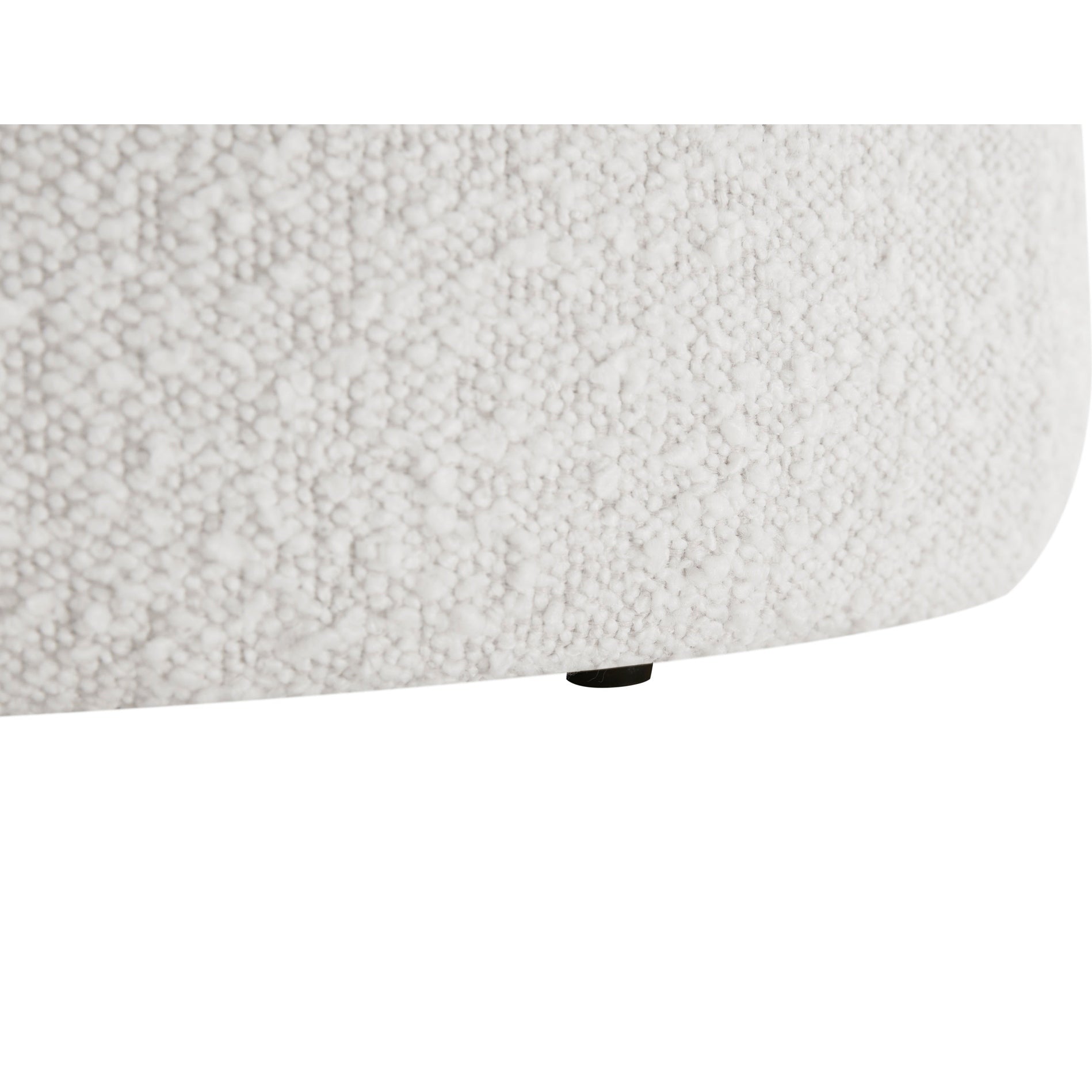 Front view of the Audo round stool featuring soft white bouclé fabric and a minimalist tapered silhouette