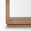 Detail shot of the integrated plinth base providing a clean floor-to-shelf transition for a modern aesthetic