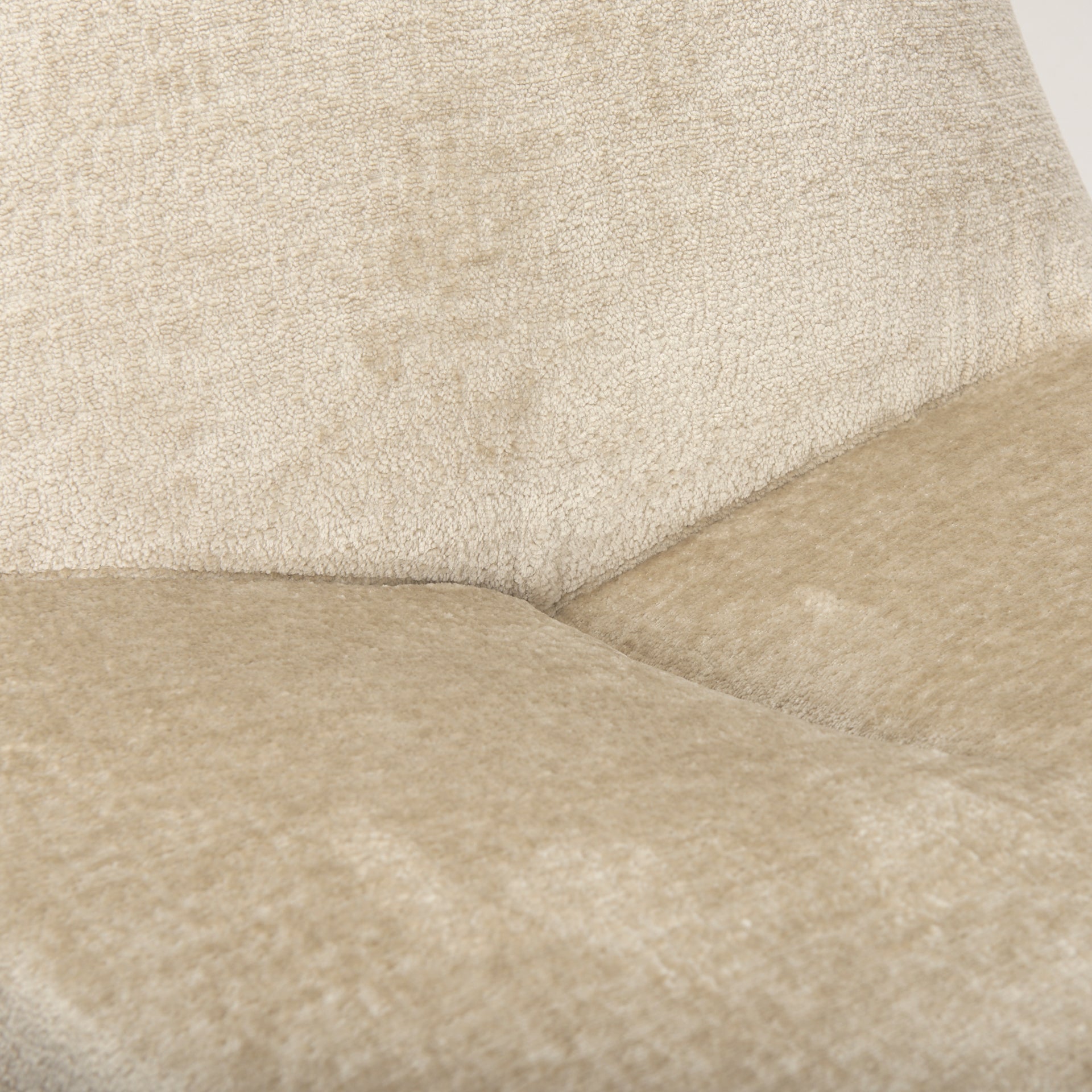Front view of the Beverly high-back accent chair in oatmeal bouclé fabric with a sculptural pebble silhouette.