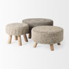 Lifestyle perspective featuring three Bina stools of various sizes styled together in a modern studio setting