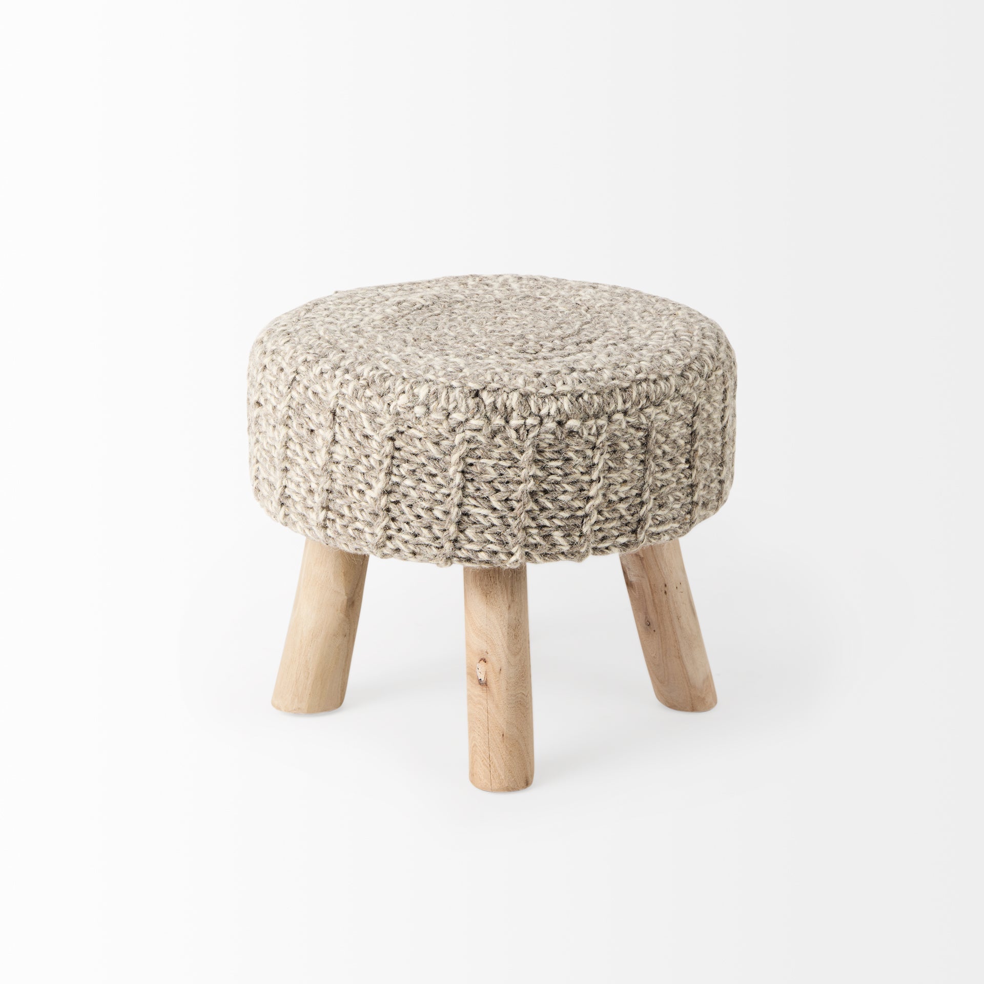 Front three-quarter view of the Bina accent stool featuring a thick gray knitted wool seat and four natural wood legs