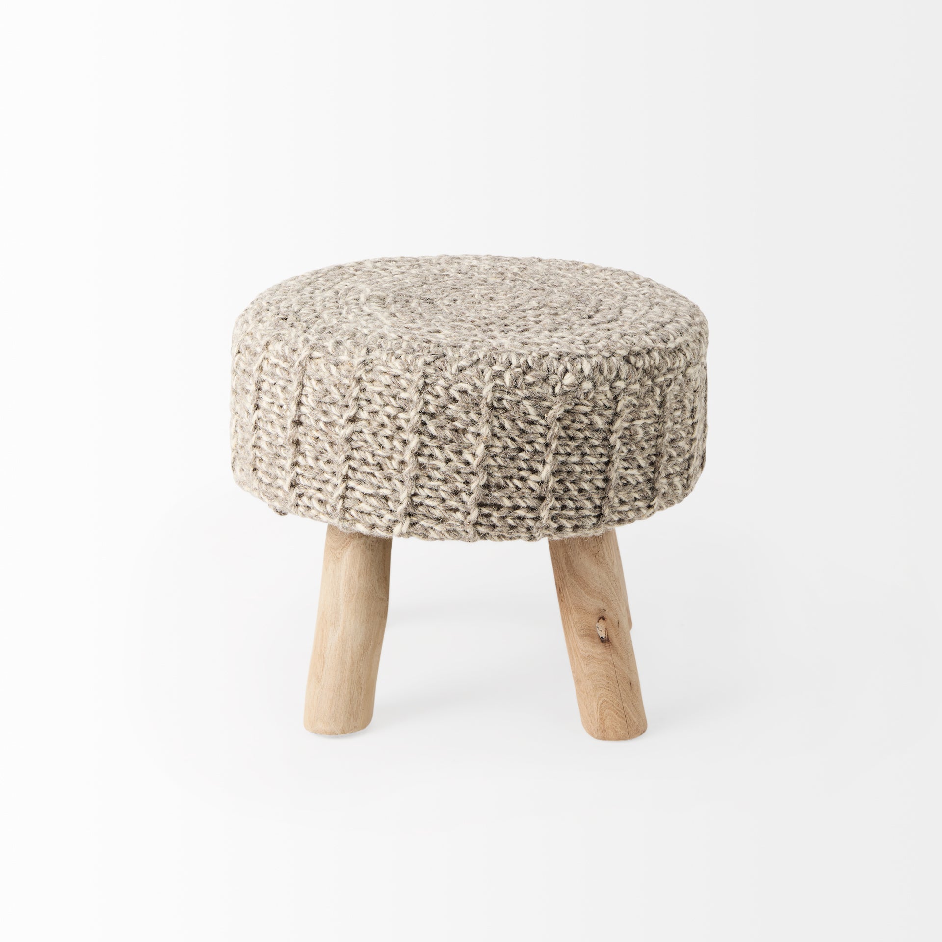 Front three-quarter view of the Bina accent stool featuring a thick gray knitted wool seat and four natural wood legs