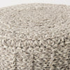 Detailed side-angle shot of the thick wool weave showcasing the depth of the hand-knitted fabric