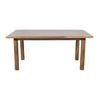 Three-quarter perspective view showcasing the clean architectural lines and sturdy construction of the mango wood table