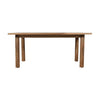 Front view of the Bodhi dining table in a light natural mango wood finish featuring a minimalist rectangular top and thick cylindrical legs