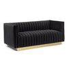 Angled perspective of the black velvet Bretz Loveseat showing the deep-seated tuxedo design