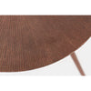 Close up detail of textured metal table edge and tapered leg