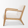 Side profile of the ivory Cashel chair emphasizing the slanted oak back legs and minimalist frame