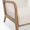 Close-up of the joint where the oak armrest meets the front leg of the Cashel chair
