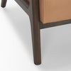 Full-screen material swatch of the tan leather used for the Cashel accent chair