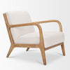Low-angle shot of the ivory Cashel chair showcasing the natural oak wood grain and sturdy build