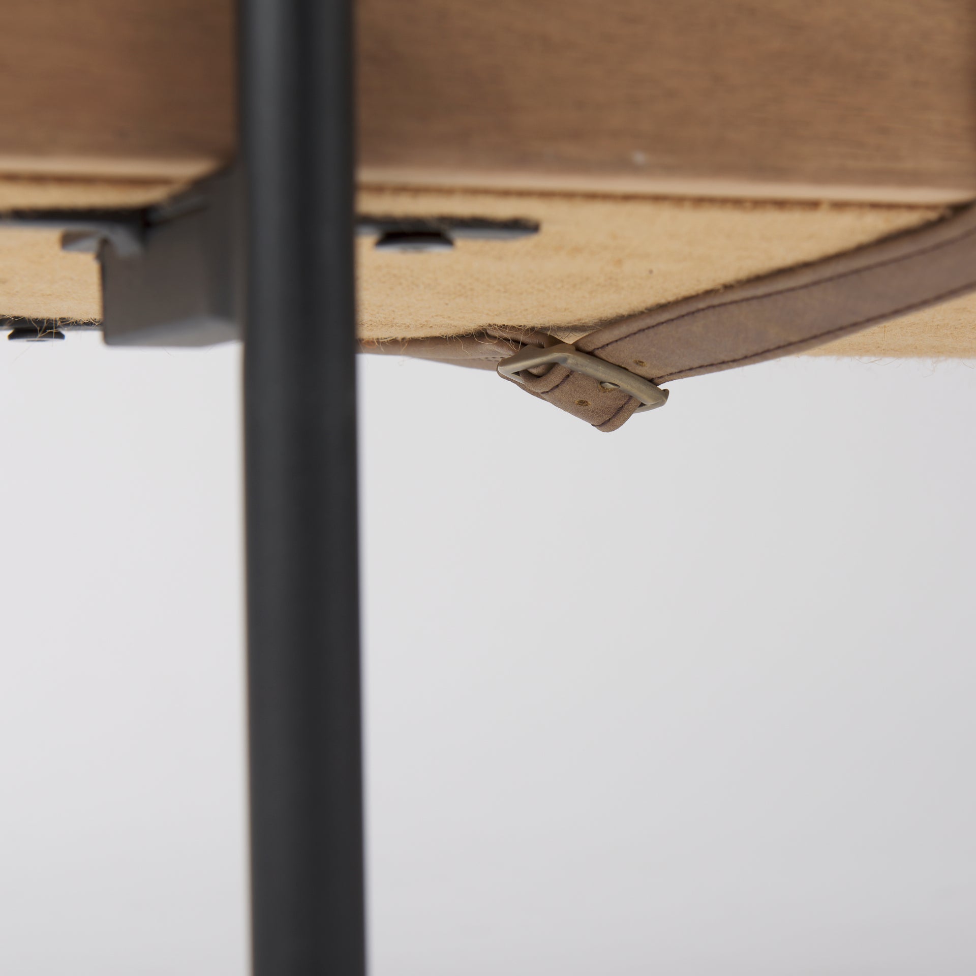 Front view of the Colburne bench featuring a beige linen-textured seat a natural wood base and black industrial metal legs