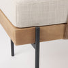 Detailed view of the bench corner showcasing the seamless integration of the wooden base with the black metal legs