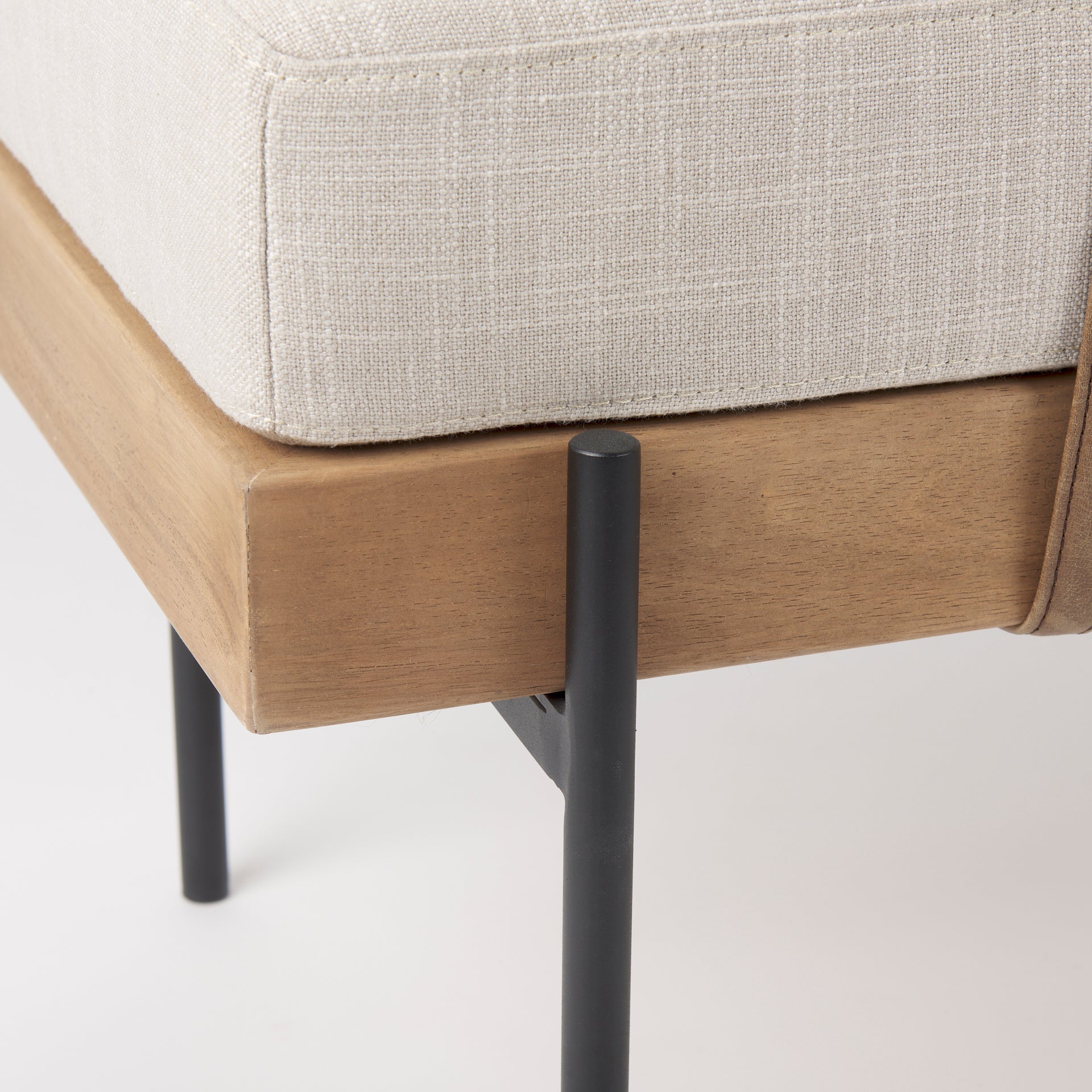 Front view of the Colburne bench featuring a beige linen-textured seat a natural wood base and black industrial metal legs