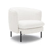 Angled view of Dorby accent chair with curved backrest