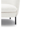 Close-up of seat cushion and metal leg on Dorby accent chair