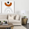 Gold toned metal side table in bright scandinavian living room