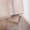 Interior view of wood storage compartment in side table