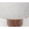 High-angle perspective detail shot highlighting the polished white marble surface and the clean rounded edge of the tabletop