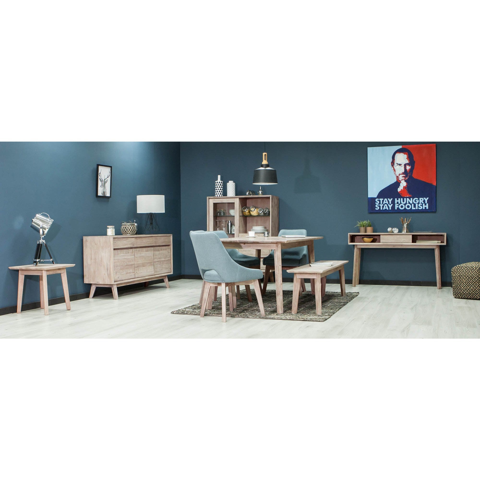 Front view of the Gia bench featuring a light weathered wood finish, rectangular top, and minimalist tapered legs