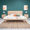 Lifestyle shot featuring the nightstand in a contemporary bedroom setting with a deep teal wall and coordinating Gia bed
