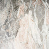 Extreme macro detail shot highlighting the intricate, colorful mineral veining of the premium marble tabletop variant