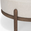 Close-up shot focusing on the rounded wood legs and the seamless joinery of the circular base frame