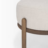 Close-up shot focusing on the rounded wood legs and the seamless joinery of the circular base frame