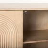 Macro shot focusing on the magnetic push-to-open latch system used for a seamless hardware-free front aesthetic
