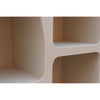 Macro shot focusing on the textured plaster-style finish and the softly rounded internal corners of the arched display niches