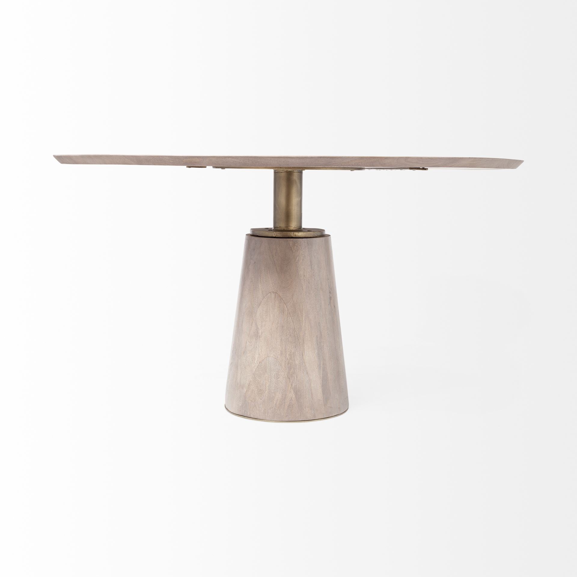 Front view of the Maxwell round dining table featuring a natural wood top and a tapered pedestal base with an antique brass metal neck