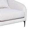 Close-up of the back of the Mikko chair highlighting the seamless upholstery and wooden support