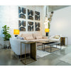 Mikko Club Chair styled in a contemporary office or living space next to a wooden side table