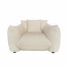 Front view of the Moa Accent Chair in white textured fabric featuring thick sculptural arched oak wood arms