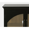 Close-up shot focusing on the slim vertical door handles and the precise arched woodwork
