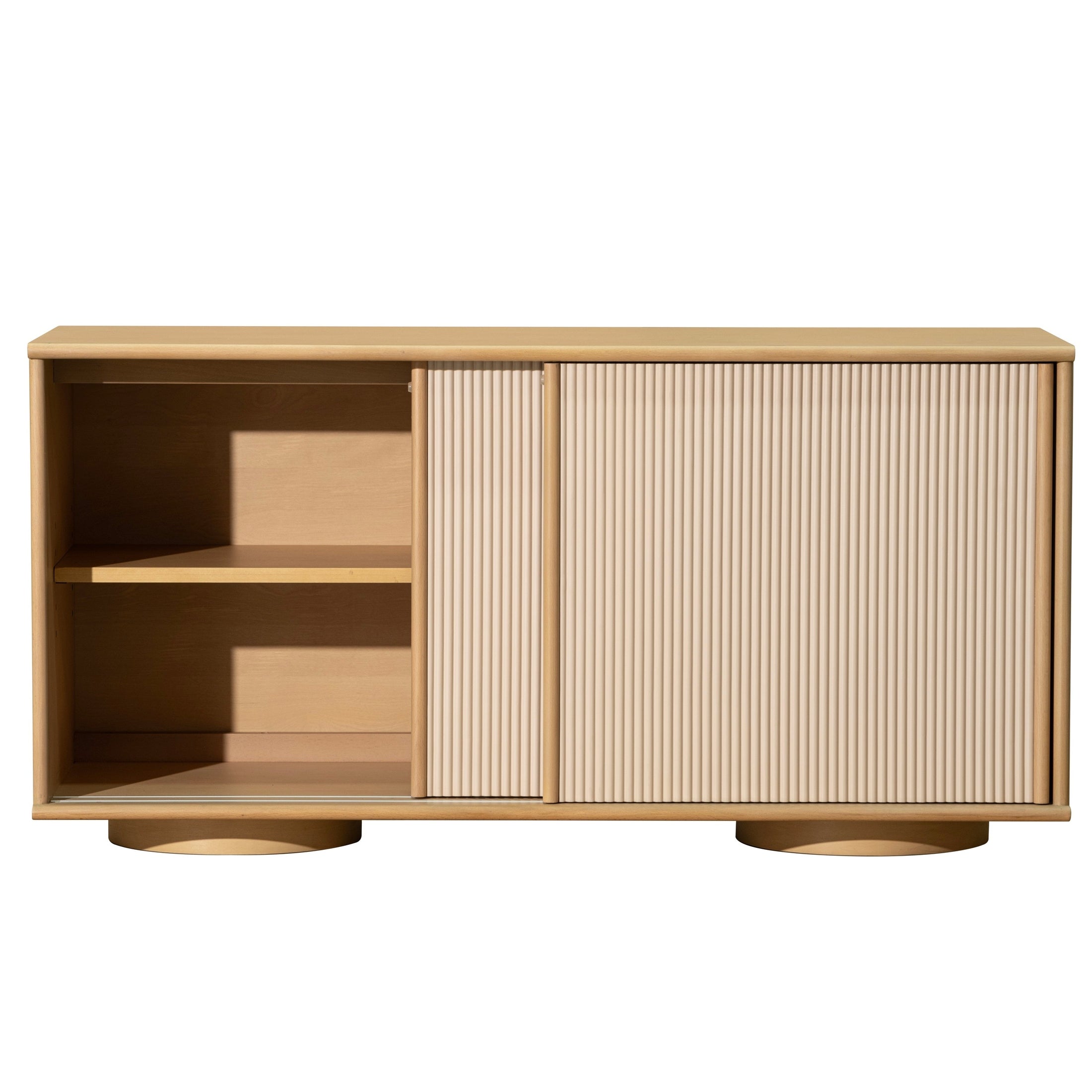 Front view of the Glee sideboard featuring light oak wood construction and two large sliding tambour doors with vertical fluted detailing
