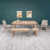 Studio lifestyle shot featuring the Gia oak table styled with a matching wooden bench and two upholstered chairs