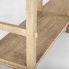 Angled perspective focusing on the lower support beam and the floor-level stability of the solid wood frame