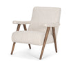 Three-quarter view of the Nico armchair showcasing its angled backrest and architectural wood frame