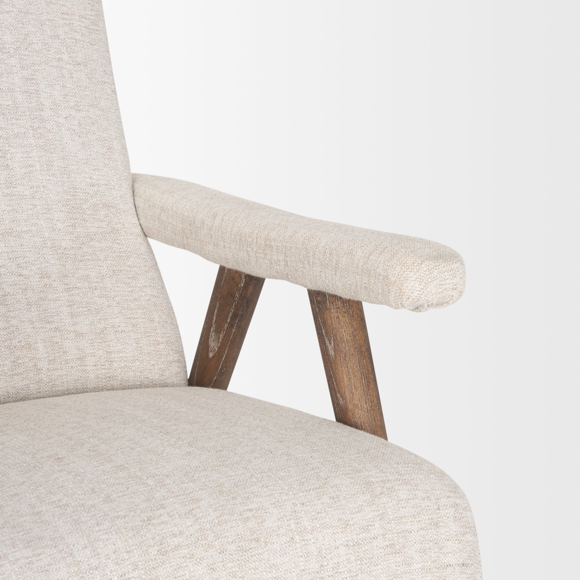 Front view of the Nico Accent Chair featuring oatmeal-colored textured fabric and dark-stained tapered wood legs