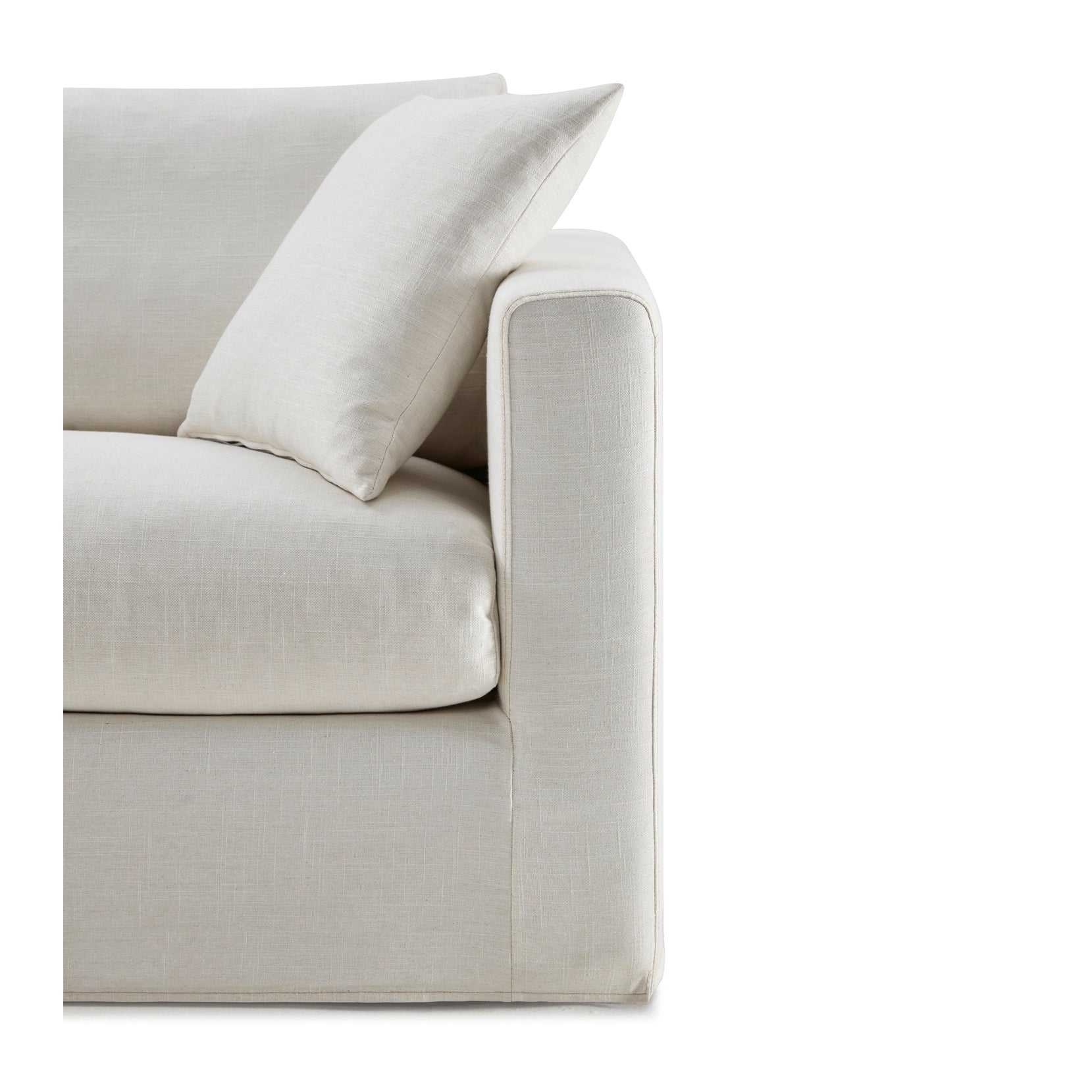 Niels sofa front view in light fabric with modern sleek design and plush cushions