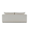 Back view of Niels sofa featuring smooth upholstery and structured cushions