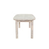 Straight-on front view showcasing the balanced proportions and minimalist design of the natural oak table