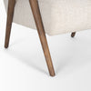 Full-frame macro shot of the oatmeal-toned textured fabric used for the Nico chair seating